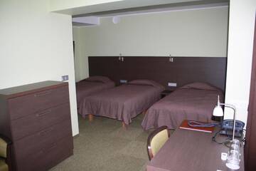 Фото номера Четырехместный номер Отель Tehvandi Hotell г. Отепя 2