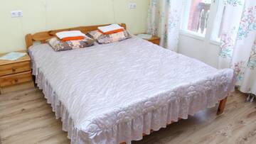 Фото номера Двухместный номер с 1 кроватью и балконом Гостевой дом Edgari Guesthouse г. Отепя 4
