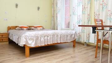 Фото номера Двухместный номер с 1 кроватью и балконом Гостевой дом Edgari Guesthouse г. Отепя 5