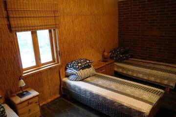 Фото номера Дом с 5 спальнями Дома для отпуска Orupesa Guest House г. Отепя 16